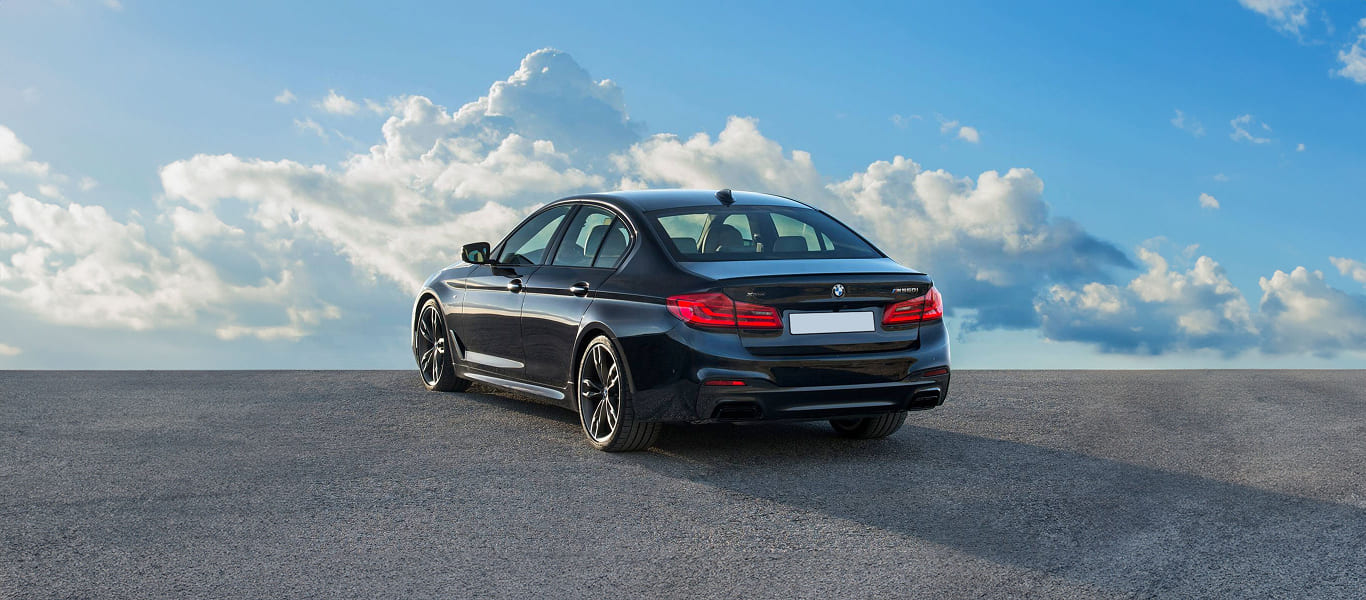 Side profile showcasing aerodynamic lines and executive appeal.