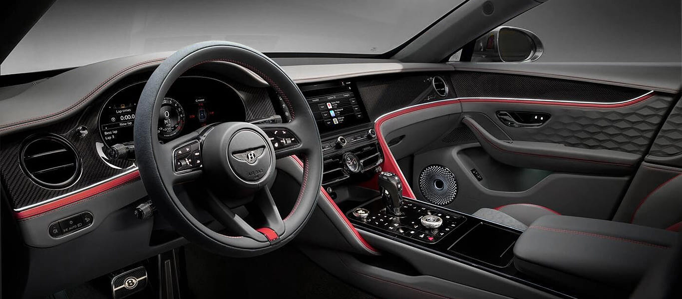 Side view showcasing muscular curves, long wheelbase, and unmistakable silhouette.