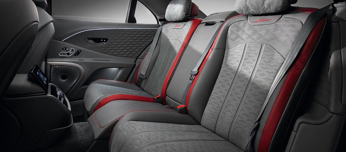 Rear angle showing off Bentley's handcrafted detailing and taillight design.