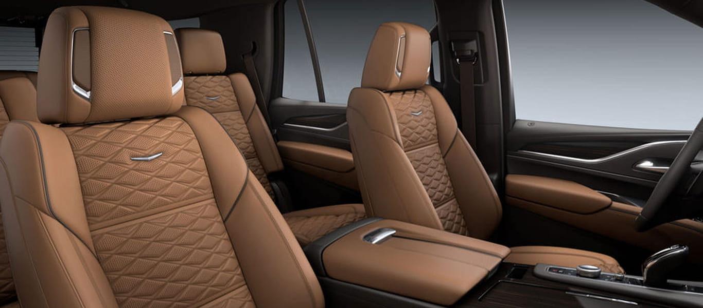 Rear shot of the Escalade featuring bold tail design and chrome trim.