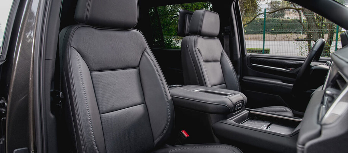 Rear three-quarter view of GMC Yukon – spacious and rugged full-size SUV
