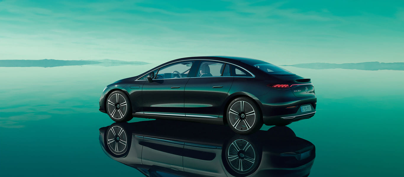 Front-facing image with illuminated badge and futuristic grille design.