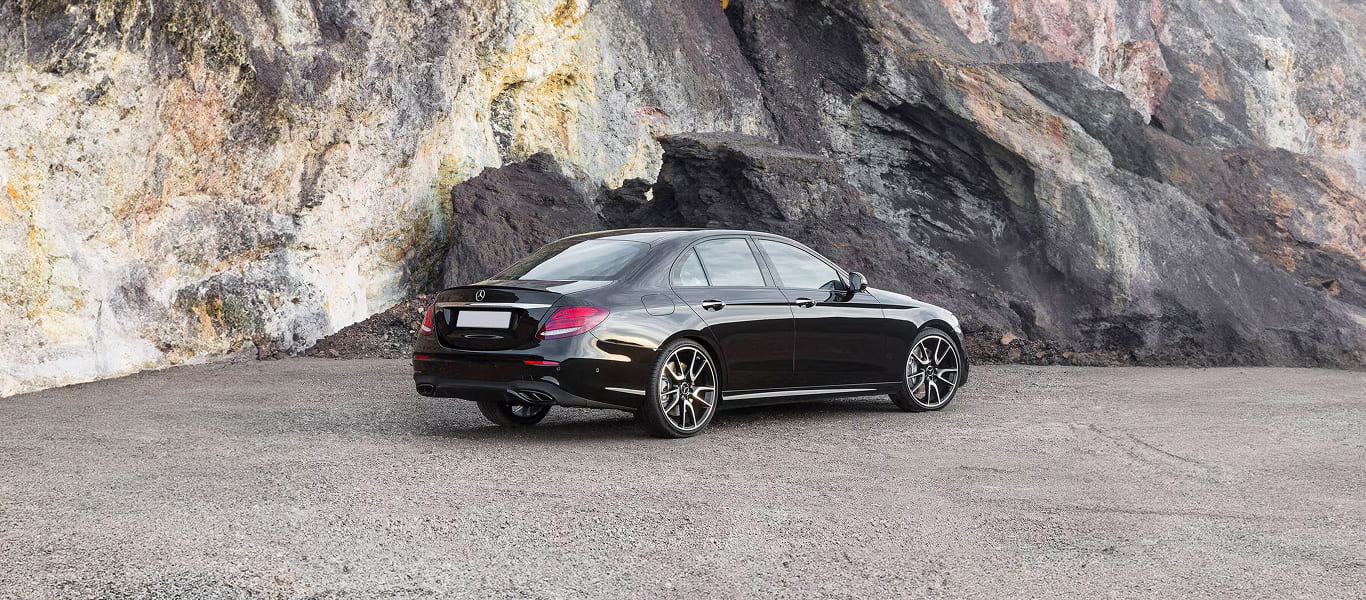 Front angle of Mercedes E300 – signature grille and smooth contours