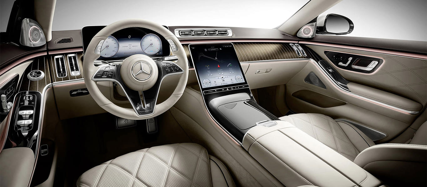 Profile view emphasizing stretched luxury proportions and two-tone paintwork.
