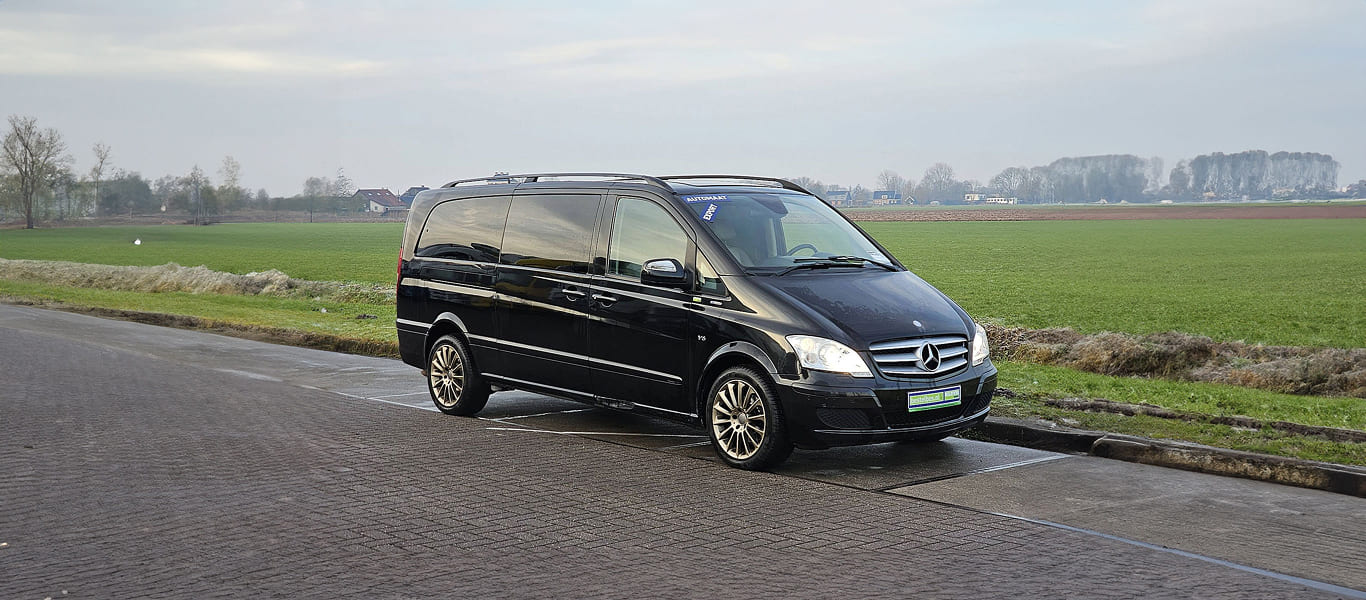 Front profile with grille details and executive-class appearance.