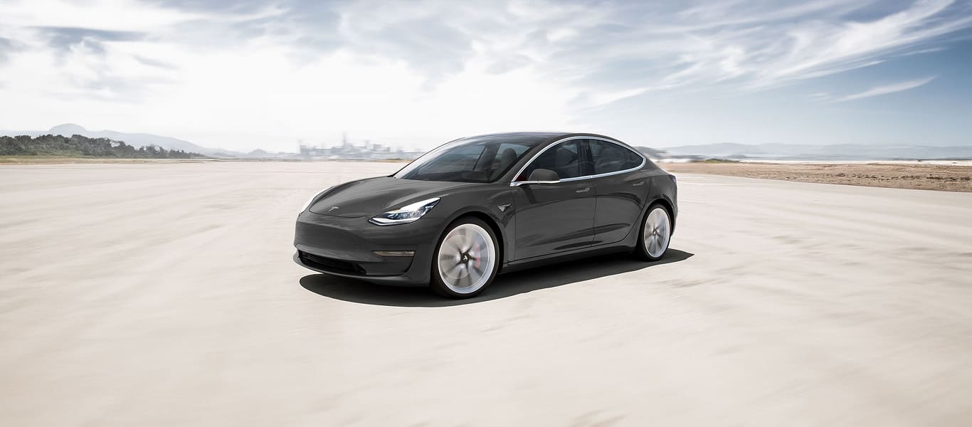 Clean front view of Tesla Model 3 – signature minimalist design and LED accents