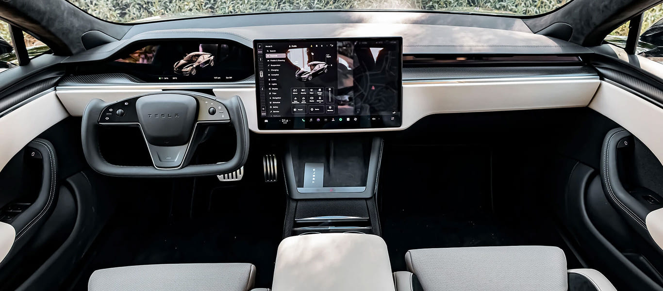 Side profile of Tesla Model S – elongated lines and elegant stance
