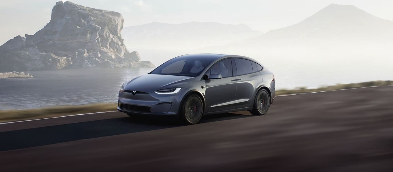 Front close-up of Tesla Model X – sleek lines and futuristic headlights
