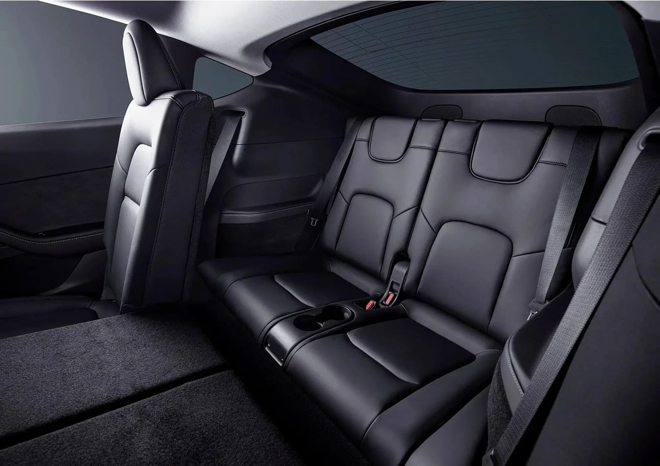 Side angle of Tesla Model Y – versatile electric SUV with sleek curves